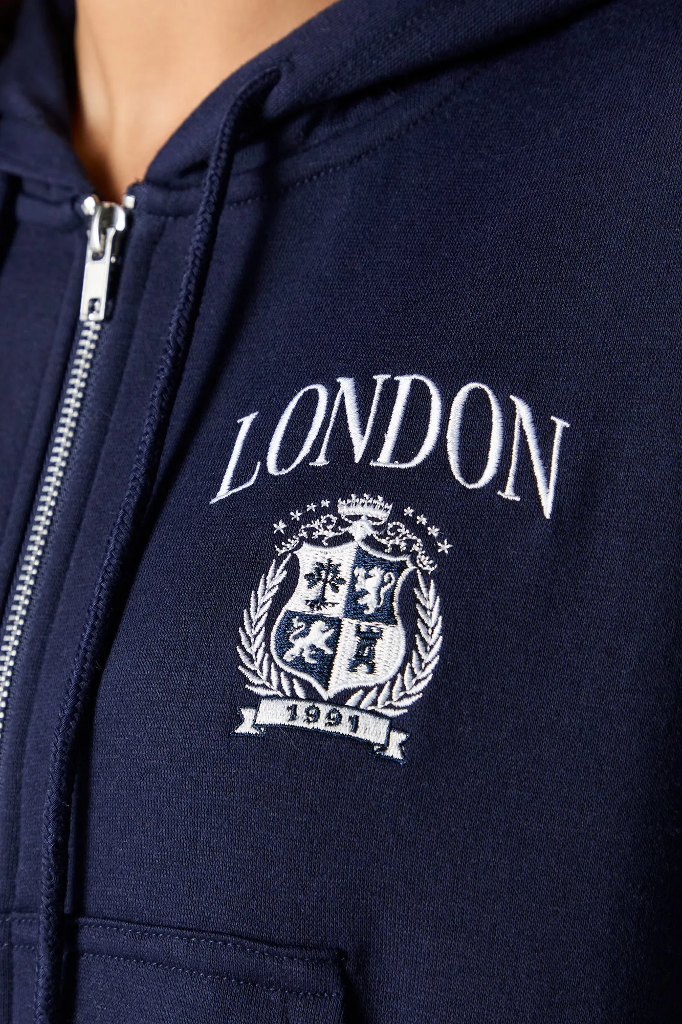 Destination Embroidered Zip-Up Cropped Hoodie